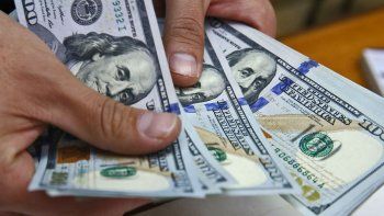 por la devaluacion china se disparo el dolar y el riesgo pais
