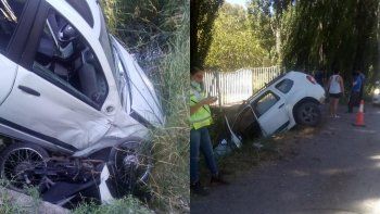 una camioneta y una moto terminaron adentro del desagüe