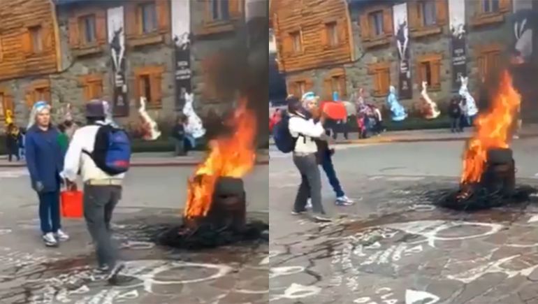 Protesta de la policía: el video viral de un hombre mojando a una mujer