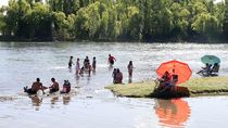 La ola de calor obligó a los valletanos a refugiarse en los balnearios del río.